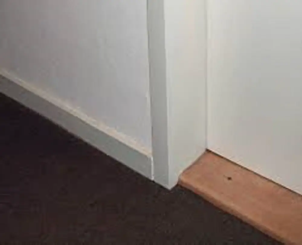 how to clean carpet against baseboards